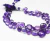 Natural Purple Amethyst Faceted Heart Drops Briolettes Beads Strand Length 4 Inches and Size 8mm to 13mm approx. Pronounced AM-eth-ist, this lovely stone comes in two color variations of Purple and Pink. This gemstones belongs to quartz family. All strands are best quality and hand picked. 